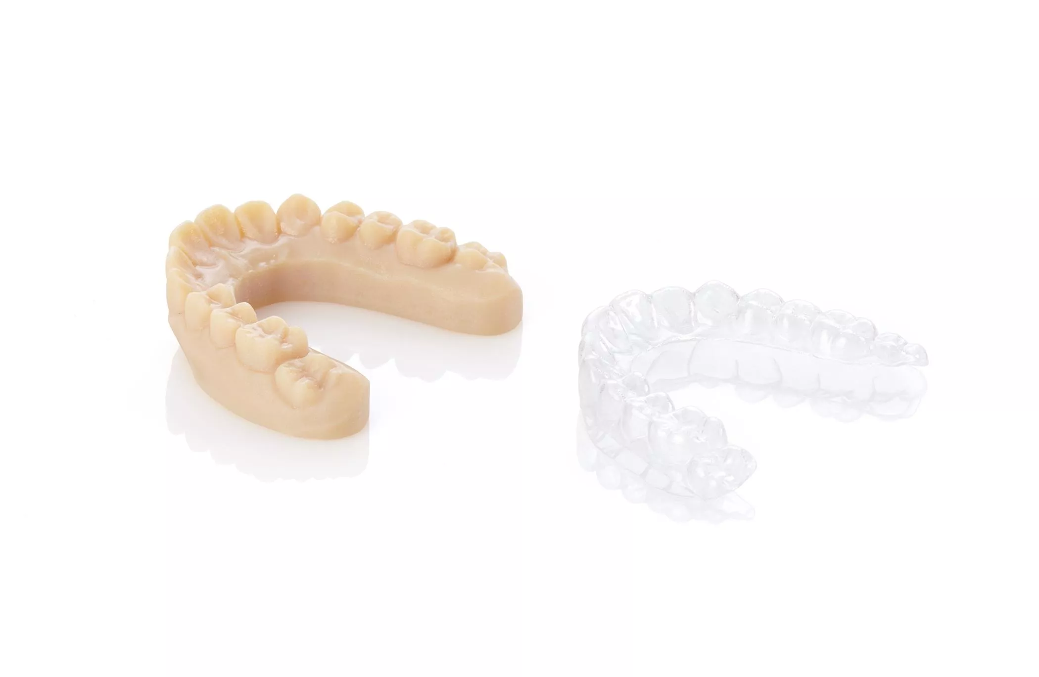 Clear aligner and matching arch 3d printed on the Stratasys J700 Dental 3D Printer. Get Pricing from GoEngineer.