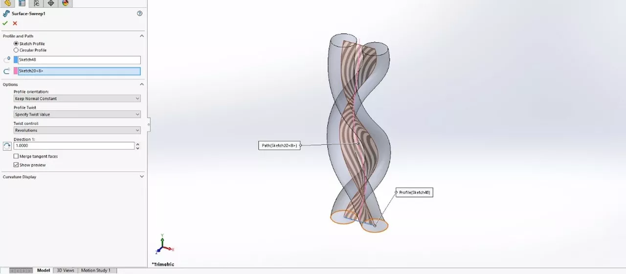 A sweep using a surface in SOLIDWORKS to create a centerline between two twisted profiles.