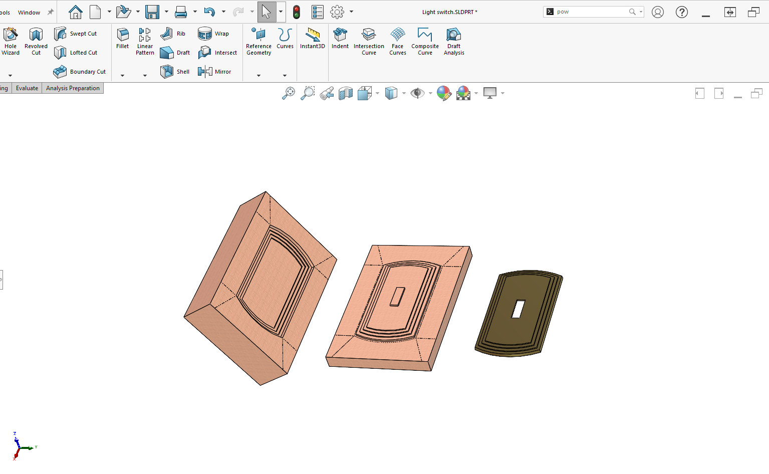 Core, cavity, and finished part as designed in SOLIDWORKS Design