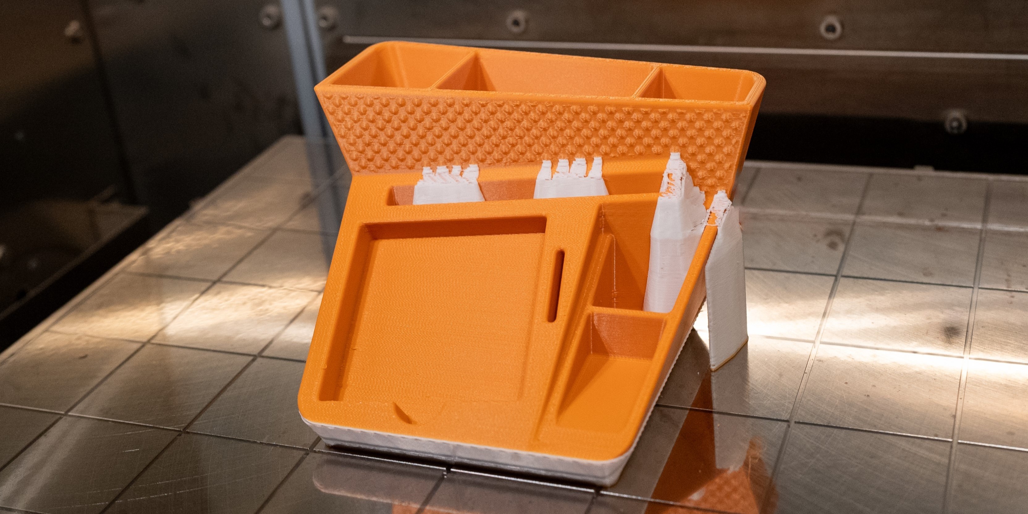 GoEngineer Community 3D printing design content winner, Bring Back the Cool Desk Organizer on the print bed of the Stratasys FDM Fortus 450mc